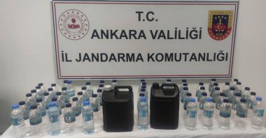 A suspect was arrested for fake alcohol production, with 4 liters of fake alcohol seized, Ankara, Türkiye, Jan. 31, 2025. (AA Photo)