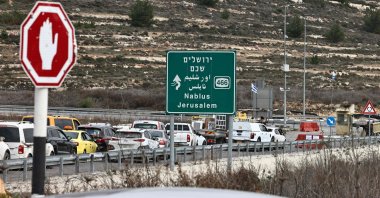 Commuters wait in their vehicles at the Israeli Atara checkpoint on route 465 near Ramallah in the occupied West Bank, Palestine, Jan. 22, 2025. (AFP Photo)