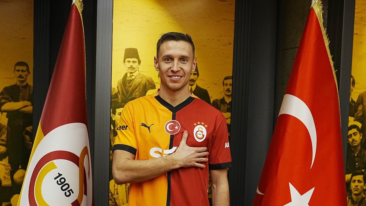 Galatasaray&#039;s new signing Przemyslaw Frankowski poses for a photo during his presentation, Istanbul, Türkiye, Feb. 10, 2025. (IHA Photo)