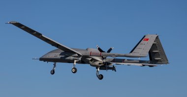 The Bayraktar TB3 UAV, developed by Turkish defense company Baykar is seen during a test flight, armed with Roketsan&#039;s MAM-T ammunition, Türkiye, Jan. 18, 2025. (AA Photo)