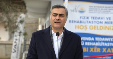 Mayor Abdullah Zeydan speaks at an opening of a physiotherapy center in eastern Van province, Türkiye, Dec. 12, 2024. (DHA Photo)