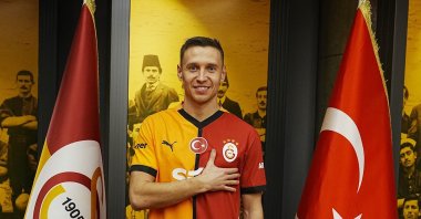 Galatasaray&#039;s new signing Przemyslaw Frankowski poses for a photo during his presentation, Istanbul, Türkiye, Feb. 10, 2025. (IHA Photo)