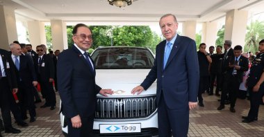 President Recep Tayyip Erdoğan presents a Togg T10X, Türkiye&#039;s domestic electric car, to Malaysian Prime Minister Anwar Ibrahim, Putrajaya, Malaysia, Feb. 11, 2025. (AA Photo)