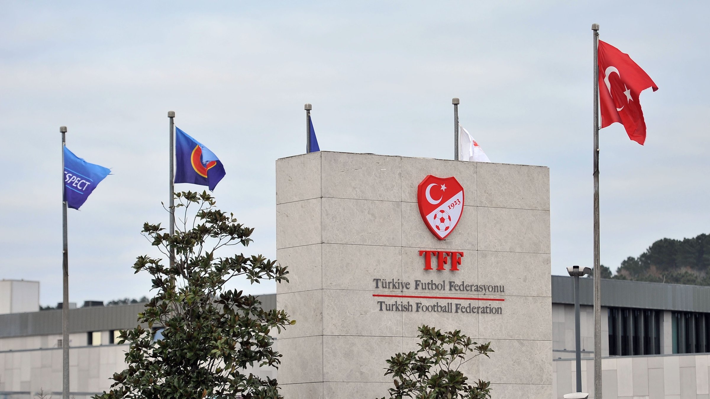 The UEFA and the Turkish flag fly high at the Turkish Football Federation (TFF) headquarters, Istanbul, Türkiye, Feb. 11, 2025. (IHA Photo)