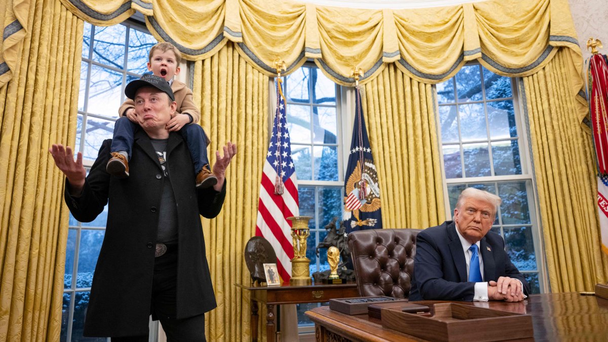 Tesla and SpaceX CEO Elon Musk, with his son X Æ A-Xii, join U.S. President Donald Trump as he signs executive orders in the Oval Office of the White House in Washington, U.S., Feb. 11, 2025. (AFP Photo)