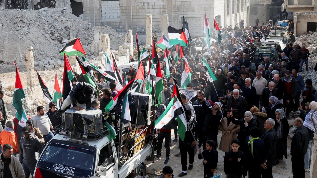 People attend a protest organized to celebrate the announcement of the cease-fire in Gaza, at Yarmouk Camp, Damascus, Syria, Jan. 17, 2025. (Reuters Photo)
