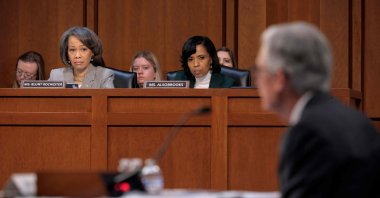 Senate Banking Committee members Sens. Lisa Blunt Rochester (D-DE) (L) and Angela Alsobrooks (D-MD) listen to testimony from Fed Chair Jerome Powell during a committee hearing, Washington, U.S., Feb. 11, 2025. (AFP Photo)