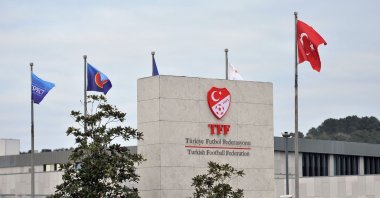 The UEFA and the Turkish flag fly high at the Turkish Football Federation (TFF) headquarters, Istanbul, Türkiye, Feb. 11, 2025. (IHA Photo)