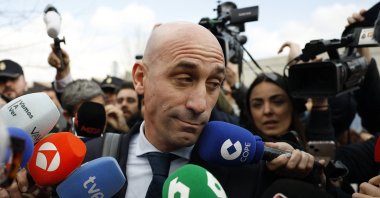 Luis Rubiales interacts with reporters as he leaves the National Court amid the examination during trial for kissing footballer Jenni Hermoso, Madrid, Spain, Feb. 11, 2025. (Reuters Photo)