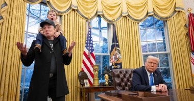 Tesla and SpaceX CEO Elon Musk, with his son X Æ A-Xii, join U.S. President Donald Trump as he signs executive orders in the Oval Office of the White House in Washington, U.S., Feb. 11, 2025. (AFP Photo)