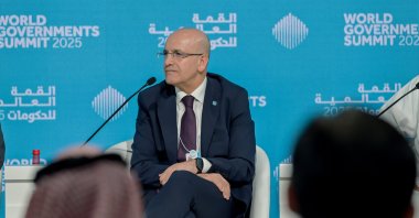 Treasury and Finance Minister Mehmet Şimşek attends a panel on the sidelines of the World Government Summit, Dubai, UAE, Feb. 12, 2025. (AA Photo)