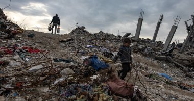 A Palestinian child walks past destroyed houses in the Jabalia camp, north of Gaza City, Palestine, Feb. 11, 2025. (EPA Photo)