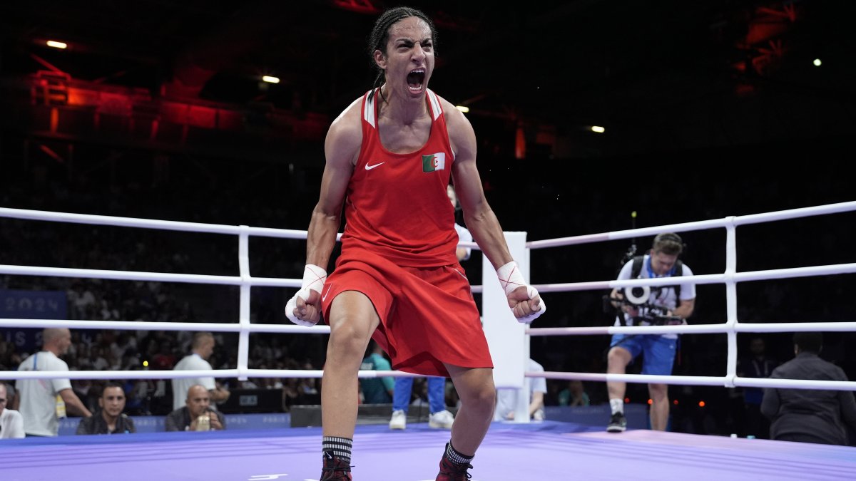 Algeria&#039;s Imane Khelif celebrates after defeating Hungary&#039;s Anna Hamori in their women&#039;s 66 kg. quarterfinal boxing match at the 2024 Summer Olympics, Paris, France, Aug. 3, 2024. (AP Photo)