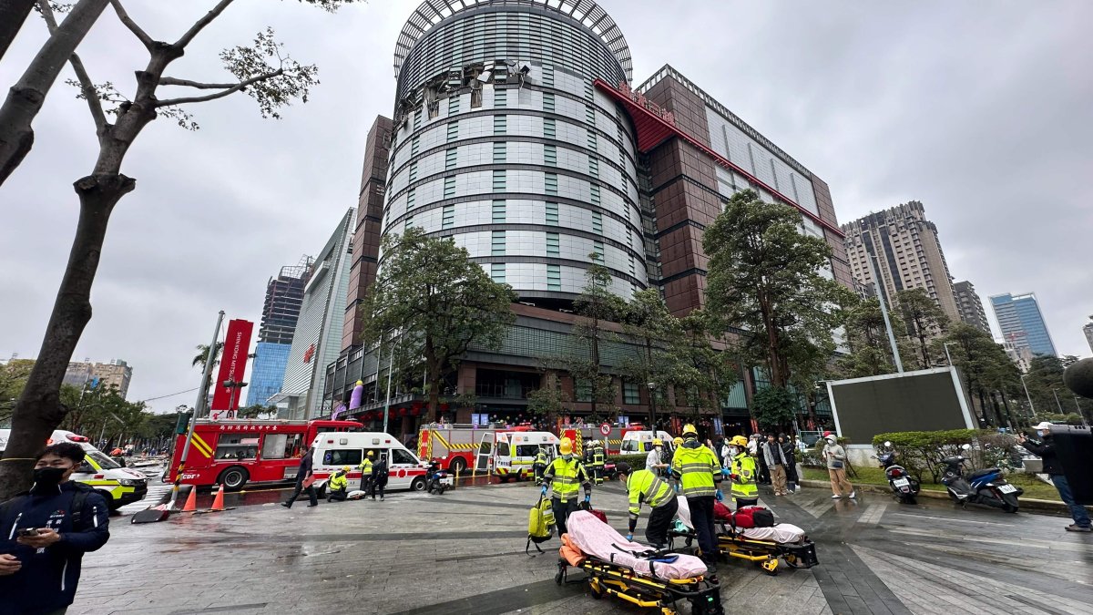 Emergency workers at the scene of a large explosion in Taichung, Taiwan, Feb. 13, 2024. (AFP Photo)