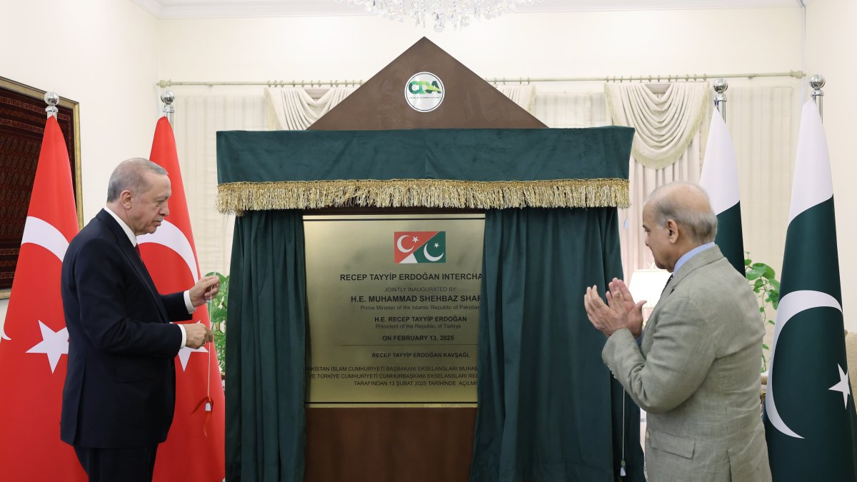 President Recep Tayyip Erdoğan and Pakistan&#039;s Prime Minister Shahbaz Sharif unveil a plaque for the newly named &quot;Recep Tayyip Erdoğan Interchange,&quot; Islamabad, Pakistan, Feb. 13, 2025. (IHA Photo)