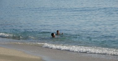 As temperatures rise in February, people enjoy swimming at the beaches of Alanya, Türkiye, Feb. 2, 2025. (IHA Photo)