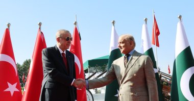 President Recep Tayyip Erdoğan shakes hands with Pakistan&#039;s Prime Minister Shahbaz Sharif, Islamabad, Pakistan, Feb. 13, 2025. (İHA Photo)