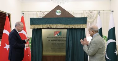 President Recep Tayyip Erdoğan and Pakistan's Prime Minister Shahbaz Sharif unveil a plaque for the newly named "Recep Tayyip Erdoğan Interchange," Islamabad, Pakistan, Feb. 13, 2025. (IHA Photo)