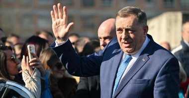 Bosnian Serb leader Milorad Dodik (R) waves at a group of supporters, as he arrives at the courthouse of Bosnia-Herzegovina, in Sarajevo, Bosnia-Herzegovina, Feb. 5, 2025. (AFP Photo)