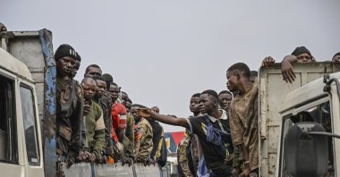 M23 rebels escort government soldiers and police who surrendered to an undisclosed location, Goma, DRC, Jan. 30, 2025. (AP Photo)