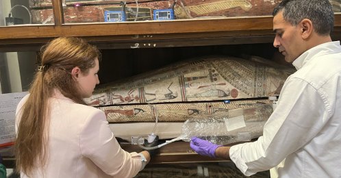 In this undated photo provided by professor Abdelrazek Elnaggar (R), Emma Paolin, Ph.D. student at University of Ljubljana, sets up active air sampling with sorbent tubes and pumps, London, U.K. (AP Photo)