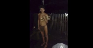 A young man from an isolated Indigenous tribe appears in Bela Rosa, in Brazil’s Amazon, Feb. 12, 2025. (AP Photo)