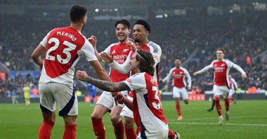 Arsenal players celebrate scoring against Leicester in a Premier League match, in Leicester, U.K., Feb. 15, 2025. (AFP Photo)