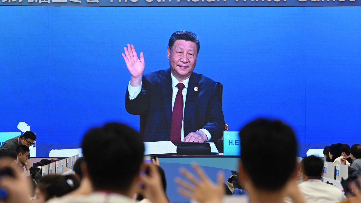 A screen at a media center shows China&#039;s President Xi Jinping attending the opening ceremony of the Harbin 2025 Asian Winter Games, Harbin, Heilongjiang province, China, Jan. 7, 2025. (AFP Photo)