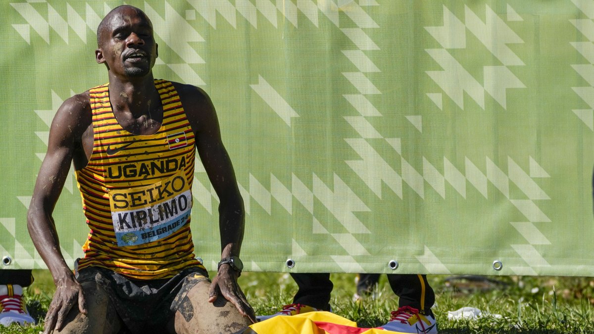 Uganda&#039;s Jacob Kiplimo celebrates as he won the men&#039;s senior race during the World Athletics Cross Country Championships, Belgrade, Serbia, March 30, 2024. (AP Photo)