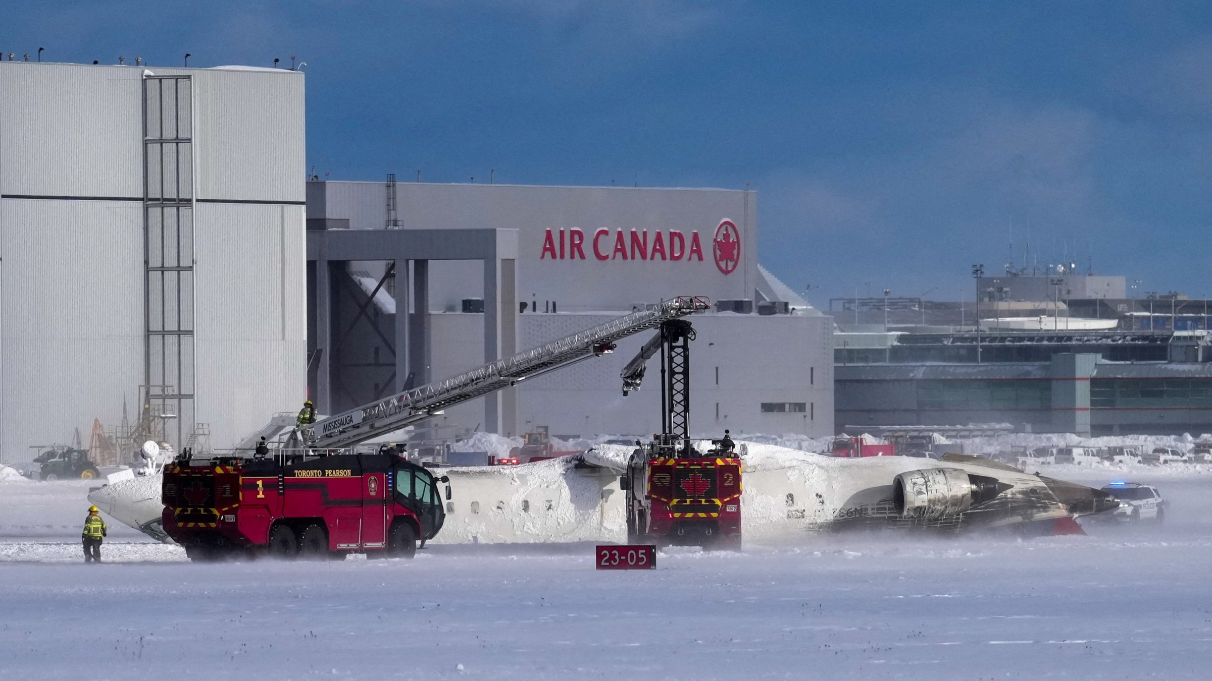 First responders work at the Delta Air Lines plane crash site at Toronto Pearson International Airport in Mississauga, Ontario, Canada Feb. 17, 2025. (Reuters Photo)