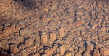 An aerial view shows houses, as pictured through the window of a plane, Cairo, Egypt, Feb. 6, 2025. (Reuters Photo)