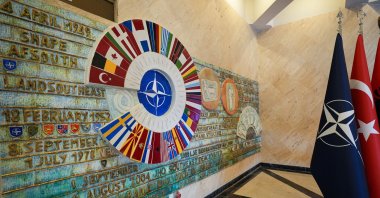 A view of the flags of Türkiye, NATO and the alliance's member states, at the Allied Land Command of NATO, Izmir, western Türkiye, Feb. 16, 2025. (AA Photo)