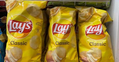 Bags of Lay&#039;s Classic potato chips are displayed at a grocery store in San Anselmo, California, U.S., Jan. 29, 2025. (AFP Photo)