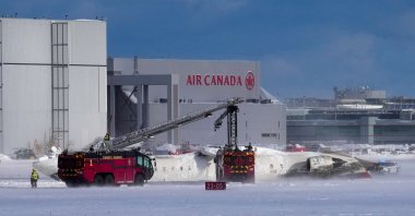 First responders work at the Delta Air Lines plane crash site at Toronto Pearson International Airport in Mississauga, Ontario, Canada Feb. 17, 2025. (Reuters Photo)