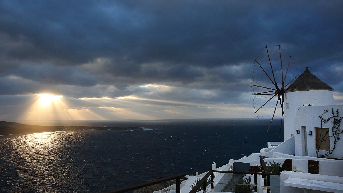 The sun sets over the almost evacuated village of Oia, Santorini, Greece, Feb. 5, 2025. (EPA Photo)