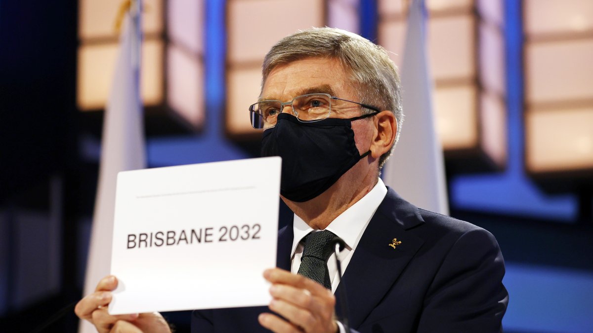 President of the International Olympic Committee Thomas Bach announces Brisbane as the 2032 Summer Olympics host city during the 138th IOC Session, Tokyo, Japan, July 21, 2021. (AP Photo)