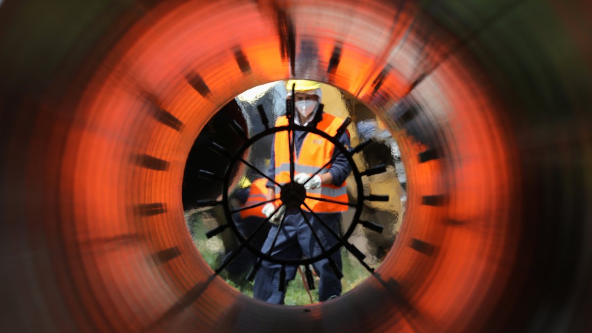 Workers are seen through a pipe at a construction site on the extension of Russia&#039;s TurkStream gas pipeline in Letnitsa, Bulgaria, June 1, 2020. (Reuters Photo)