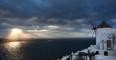 The sun sets over the almost evacuated village of Oia, Santorini, Greece, Feb. 5, 2025. (EPA Photo)