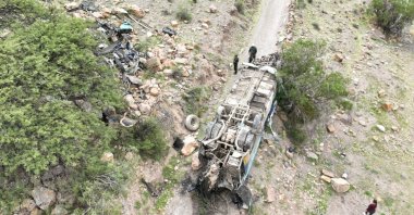 Emergency personnel respond to the scene of a deadly crash after a bus dropped off a precipice, Yocalla, Bolivia, Feb. 17, 2025. (Reuters Photo)