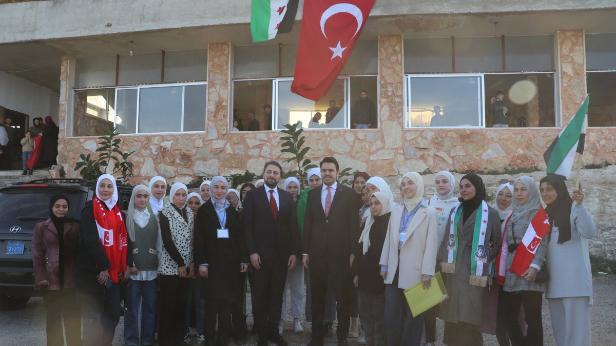Presidency for Turks Abroad and Related Communities (YTB) President Abdullah Eren (C-R) and Halep Consul General Hakan Cengiz (C-L) meet with students in Turkmen villages, Latakia province, Syria, Feb. 18, 2025. (AA Photo)