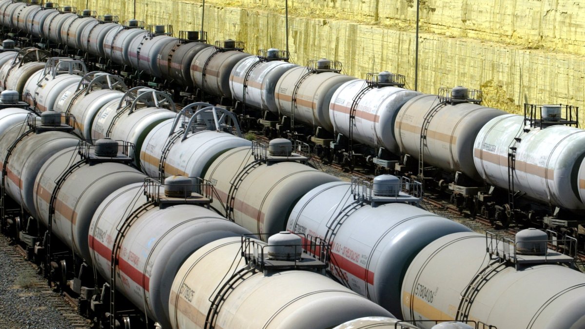 Tank wagons stand in line next to sulfur stored at the Tengiz oil and gas refinery plant in western Kazakhstan. (Reuters Photo)
