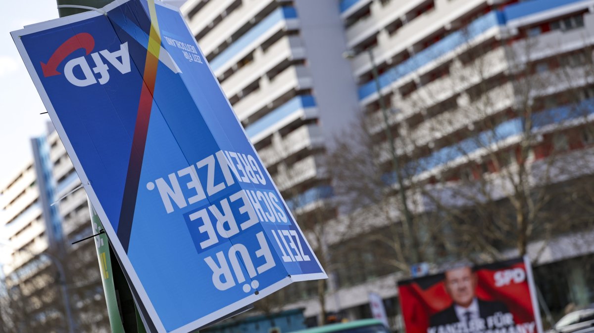 An upside-down Alternative for Germany (AfD) party election campaign poster is displayed in Berlin, Germany, Feb. 17, 2025. (EPA Photo)