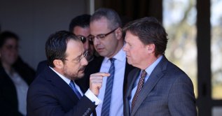 Greek Cypriot administration leader Nikos Christodoulides speaks with U.N. Cyprus representative Colin Stewart after a meeting with Turkish Cypriot leader Ersin Tatar in the U.N. buffer zone, Lefkoşa (Nicosia), TRNC, Jan. 20, 2025. (Reuters Photo)