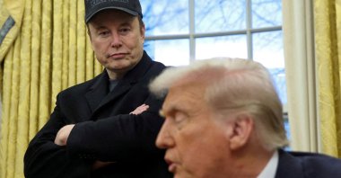 Elon Musk listens to U.S. President Donald Trump speak in the Oval Office of the White House, Washington, U.S., Feb. 11, 2025. (Reuters Photo)
