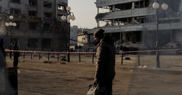 A man walks next to damaged buildings following a missile attack, Kyiv, Ukraine, Feb. 12, 2025. (AFP Photo)