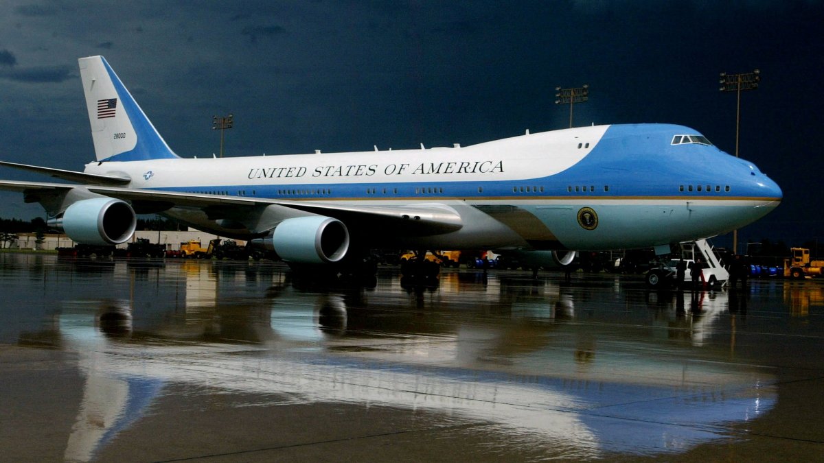 Air Force One is reflected in the rain-soaked tarmac at Sawyer International Airport in Michigan, U.S. in this undated photo. (Reuters File Photo)