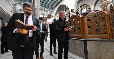 Visiting Jewish worshippers attend the first prayer since 1992, held in the Ifrange Synagogue in the Jewish quarter in Old Damascus' Bab Sharqi neighborhood, Syria, Feb. 19, 2025. (AFP Photo)