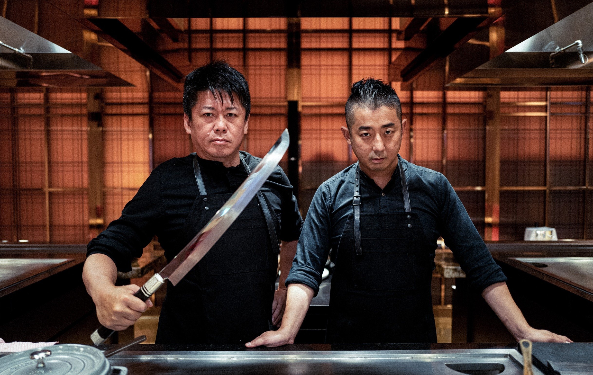 Chef and wagyu expert Hisato Hamada (R) and entrepreneur Takafumi Horie (L) pose together, Tokyo, Japan. (Courtesy of İlker Topdemir)
