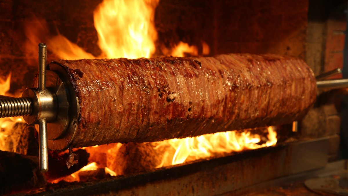 Cağ kebabı (pictured) is a traditional dish from Erzurum, made with marinated lamb or beef cooked on a vertical rotisserie, served with flatbread. (Shutterstock Photo)