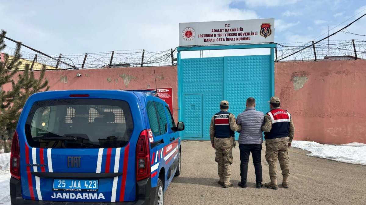 Police escort to a penitentiary a fugitive teacher convicted of links to FETÖ, eastern Erzurum province, Türkiye, Feb. 18, 2025. (AA Photo)